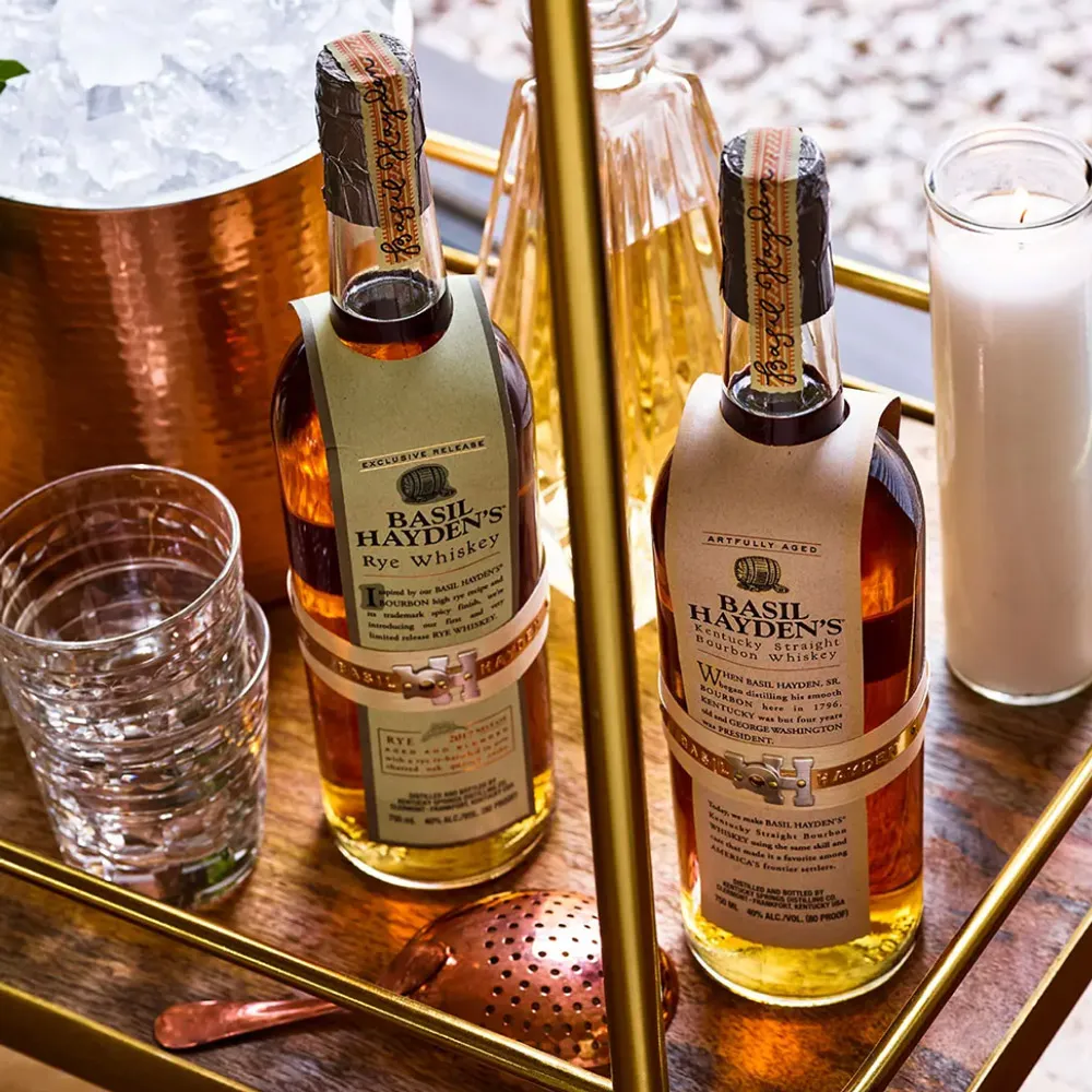 Bottles of Basil Hayden Rye Whiskey on a bar